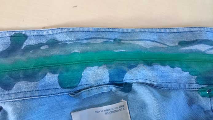 Liquide vaisselles sur chemise